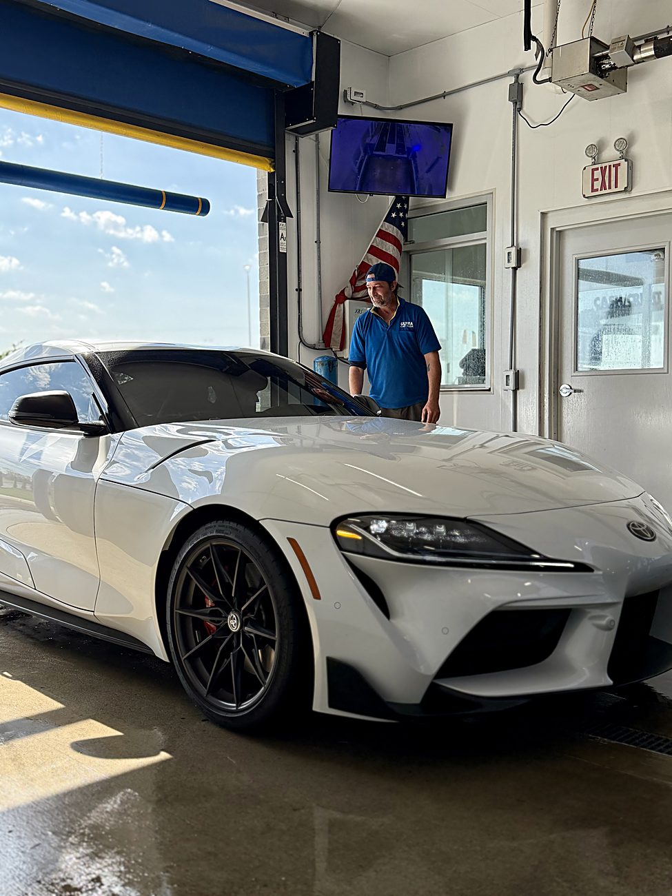 A clean car at the Ultra Car Wash tunnel exit