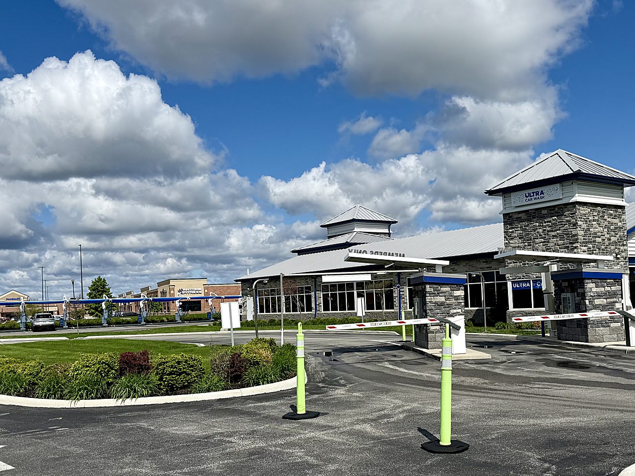 Ultra Car Wash building under blue sky