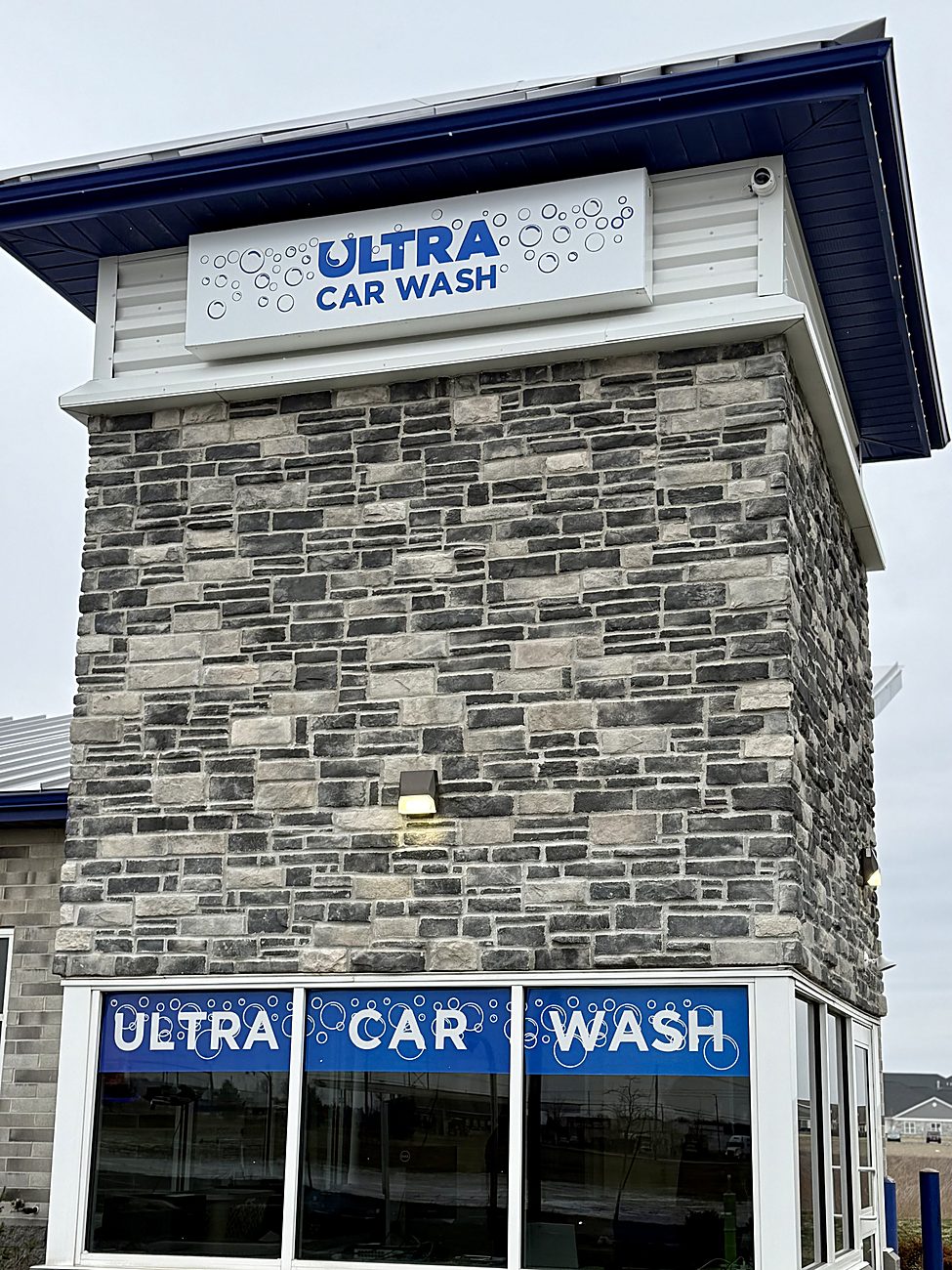 Ultra Car Wash signage on the building